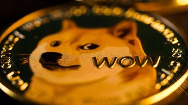 Close-up of a physical Dogecoin coin featuring the Shiba Inu dog